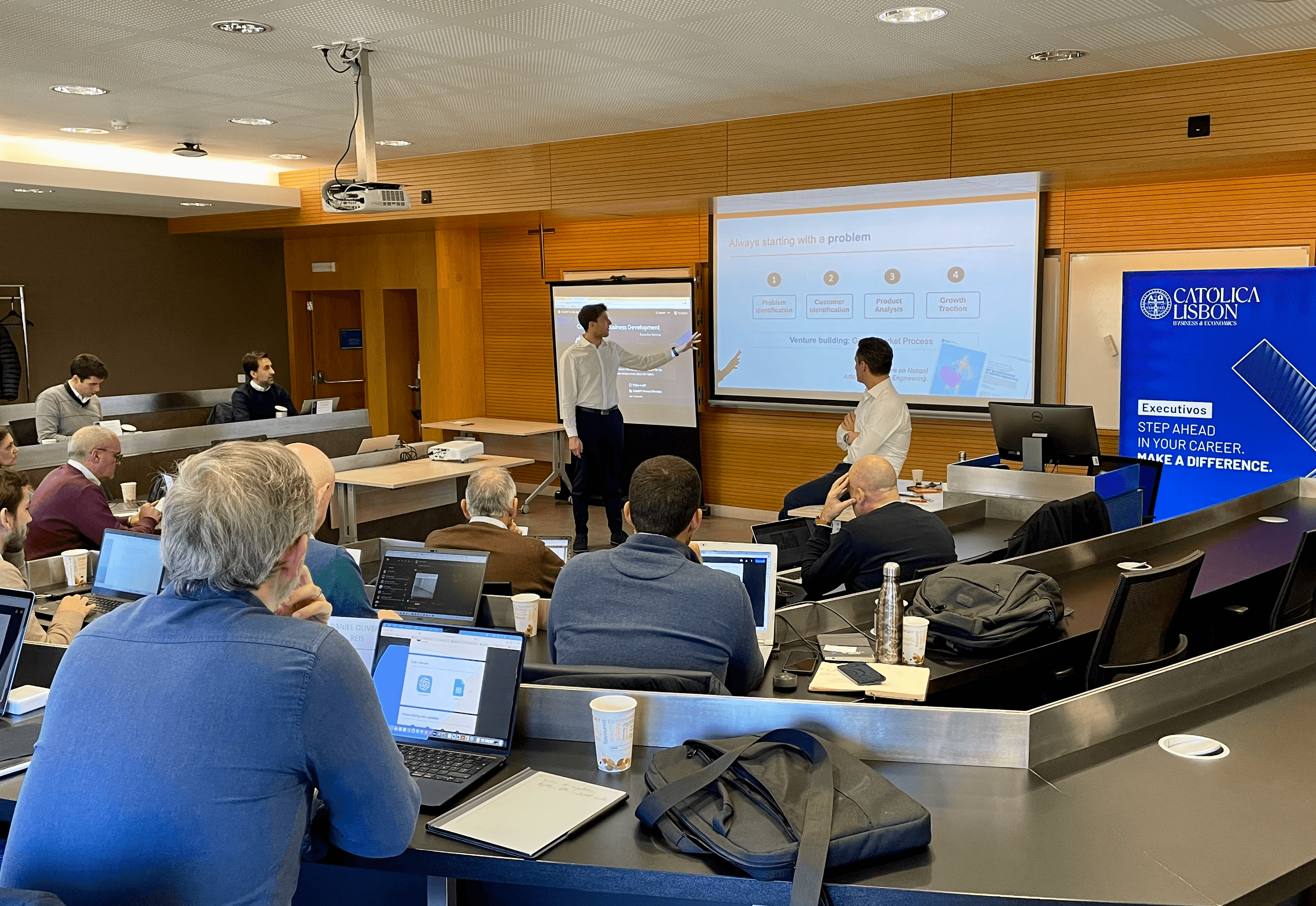 Marco Kohns teaching an executive-education AI workshop at Católica Lisbon